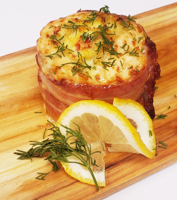 Cedar Plank Salmon wrapped in bacon with Crab Stuffing