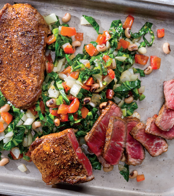 Oven-Roasted Berbere-Spiced New York Strip Steak with Collard Greens